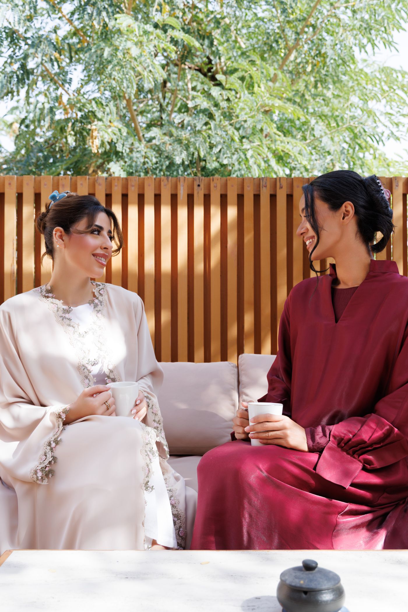 Alexandre de Paris Ramadan Noor campaign: two women sharing tea