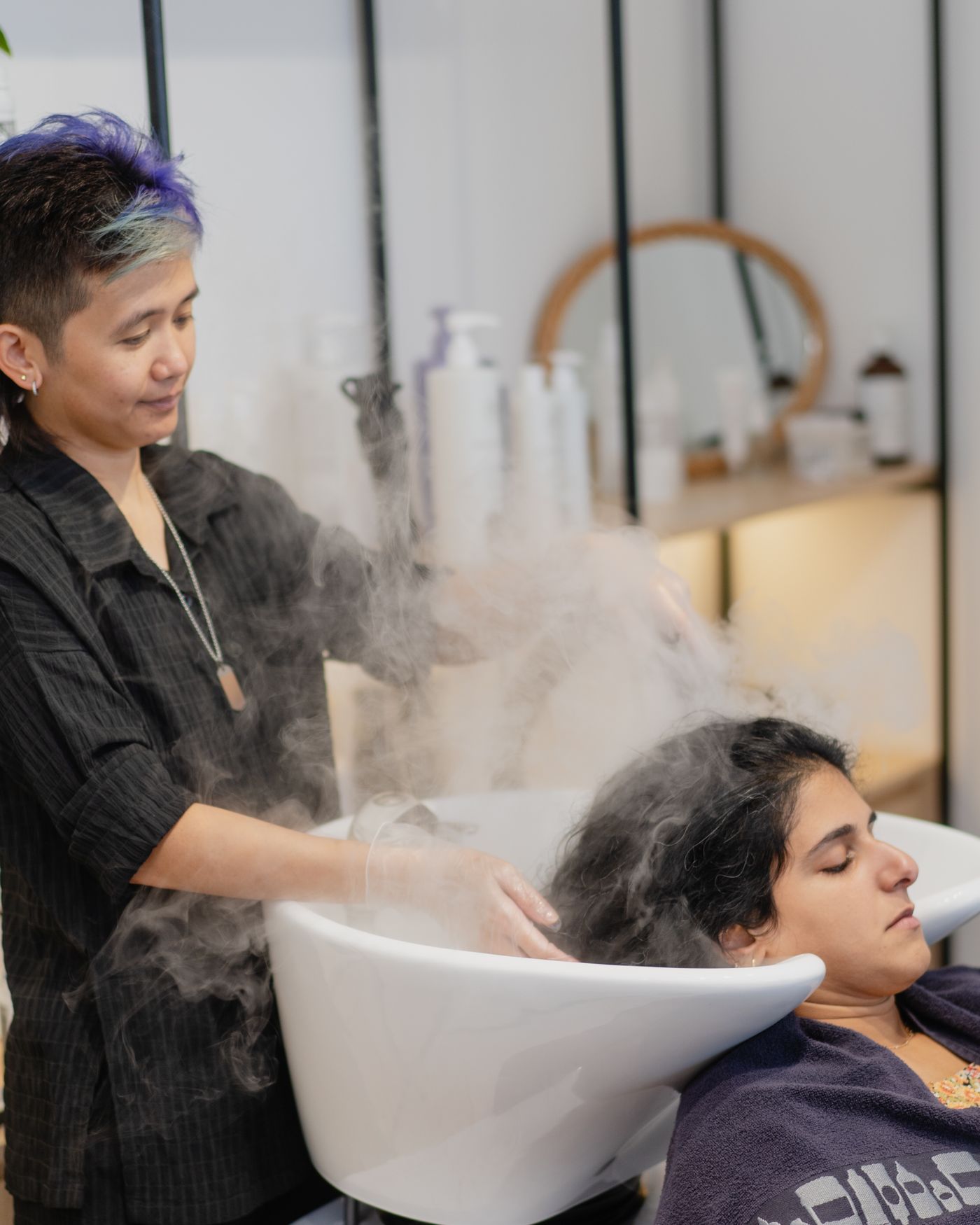 Micro-mist scalp treatment at a salon backwash during the Hair Beauty Network launch with BOHO Salon